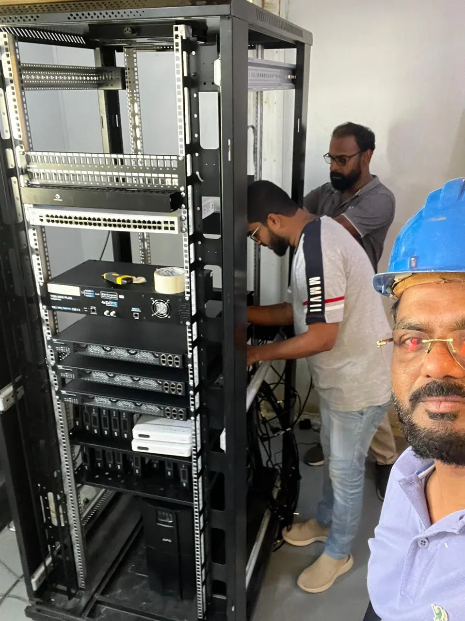 Dammam hotel and facility integration example showing iPTV headend and network rack installation for the Saudi labour camp project