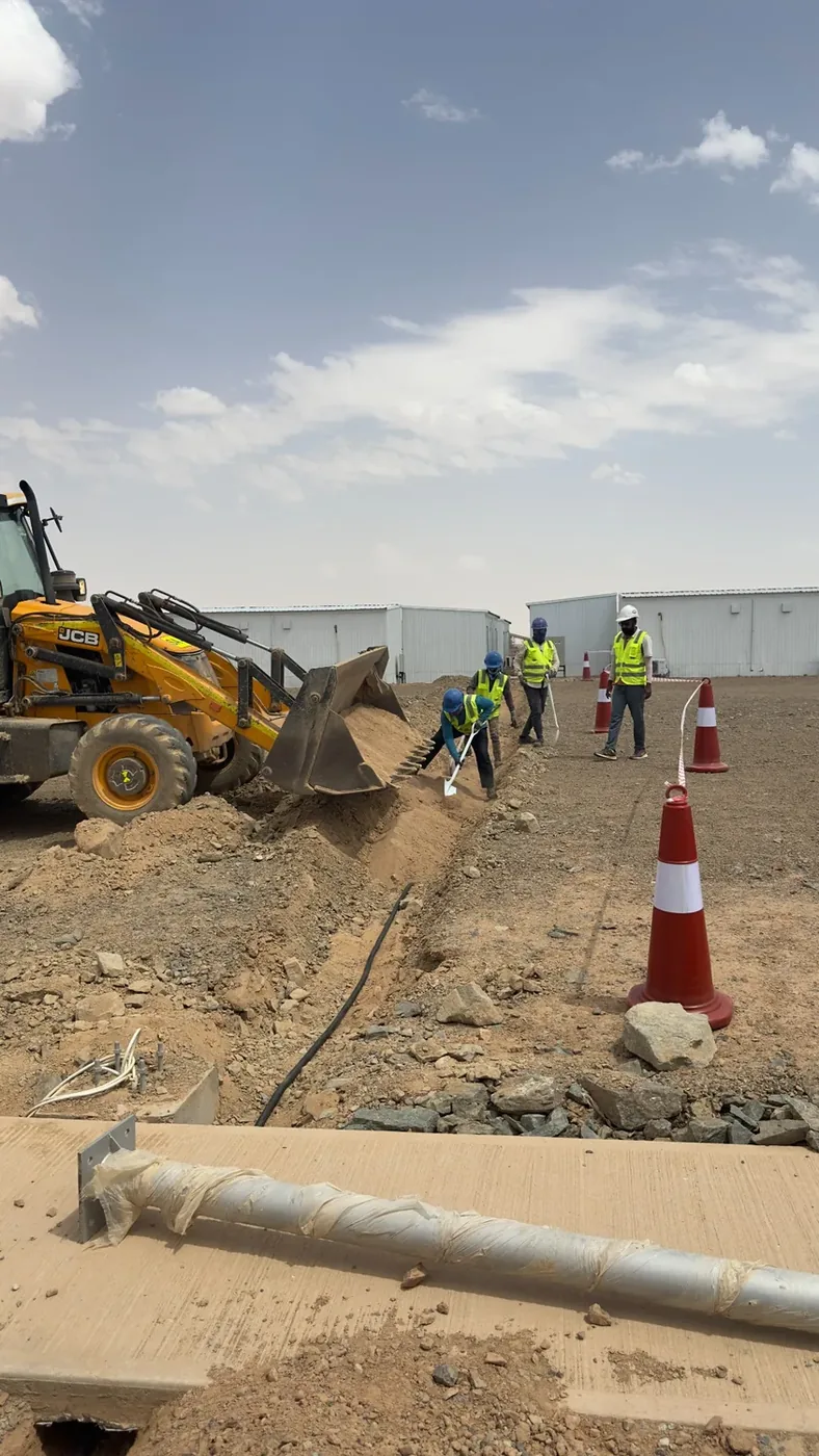 Dammam hotel and facility integration example showing underground cabling and trenching work for the Saudi labour camp IPTV and Wi-Fi project